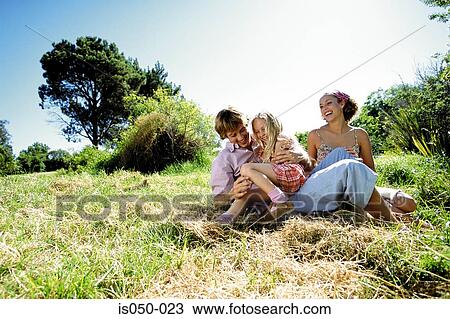 Parents playing with daughter View Large Photo Image Stock Image - Parents playing with daughter. Fotosearch