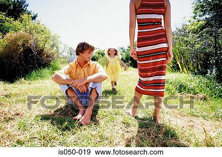 Parents playing with daughter View Large Photo Image Stock Photo - Parents playing with daughter. Fotosearch