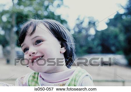 Portrait of a little girl View Large Photo Image Stock Photo - Portrait of a little girl . Fotosearch