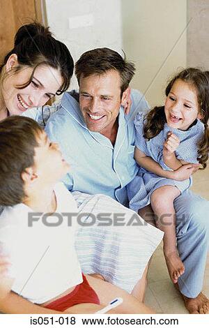Stock Photo - Family having fun. Fotosearch