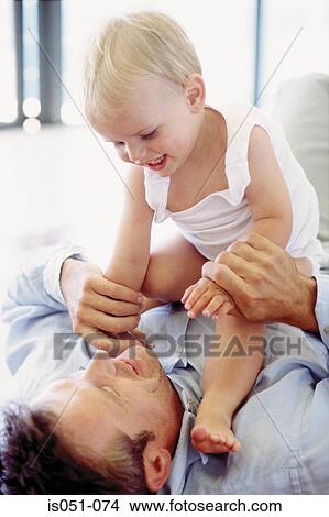 Father playing with toddler View Large Photo Image Picture - Father playing with toddler. Fotosearch