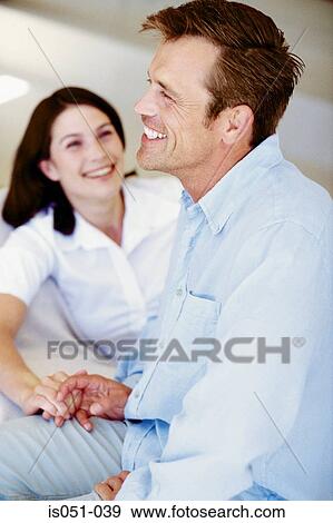 Happy couple holding hands View Large Photo Image Stock Photo - Happy couple holding hands. Fotosearch