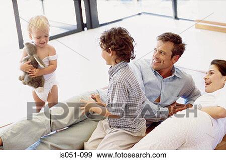 Happy family at home View Large Photo Image Stock Photo - Happy family at home. Fotosearch
