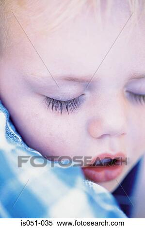Stock Photography - Portrait of a baby sleeping . Fotosearch