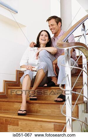 Young couple at home View Large Photo Image Stock Photo - Young couple at home. Fotosearch
