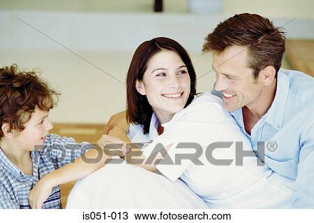 Young couple with son View Large Photo Image Stock Image - Young couple with son. Fotosearch