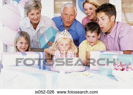 Birthday girl blowing the candles View Large Photo Image Stock Photograph - Birthday girl blowing the candles. Fotosearch