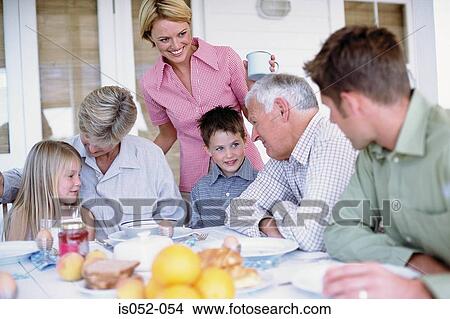 Picture - Family having breakfast. Fotosearch