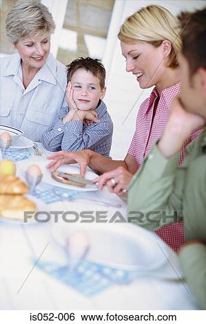 Family having breakfast View Large Photo Image Stock Photograph - Family having breakfast. Fotosearch