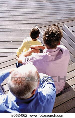 Stock Image - Father, son and grandad. Fotosearch