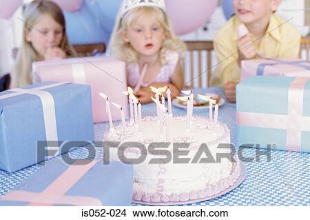 Girl with birthday cake View Large Photo Image Picture - Girl with birthday cake. Fotosearch