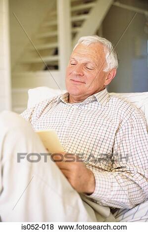 Stock Photo - Man reading . Fotosearch