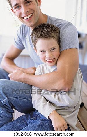 Portrait of father and son View Large Photo Image Stock Photo - Portrait of father and son. Fotosearch