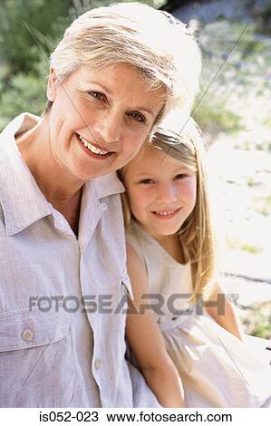 Portrait of grandmother with granddaughter View Large Photo Image Stock Image - Portrait of grandmother with granddaughter. Fotosearch