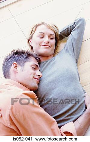 Young couple relaxing View Large Photo Image Stock Image - Young couple relaxing. Fotosearch