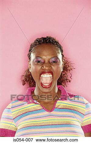 Angry young woman screaming View Large Photo Image Stock Photo - Angry young woman screaming. Fotosearch