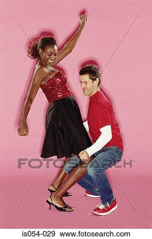 Stock Photo - Funky couple dancing. Fotosearch
