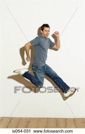 Man jumping View Large Photo Image Stock Image - Man jumping . Fotosearch