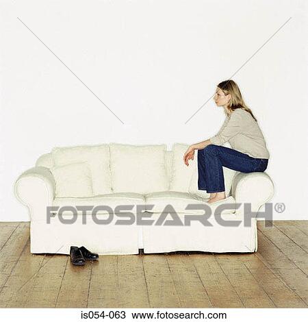 Woman on the sofa View Large Photo Image Stock Image - Woman on the sofa. Fotosearch