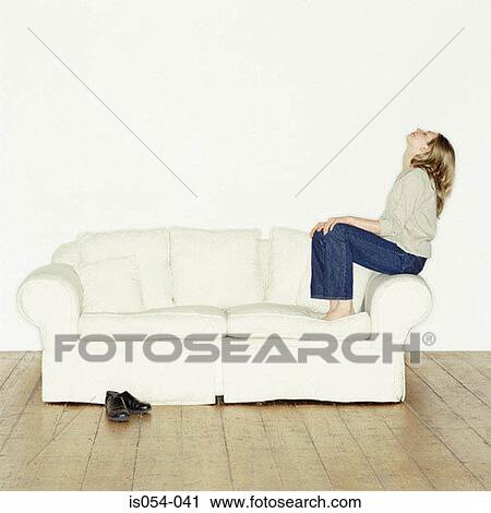 Woman relaxing at home View Large Photo Image Stock Image - Woman relaxing at home. Fotosearch