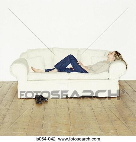Woman relaxing at home View Large Photo Image Stock Image - Woman relaxing at home. Fotosearch