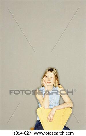 Stock Photo - Woman thinking. Fotosearch
