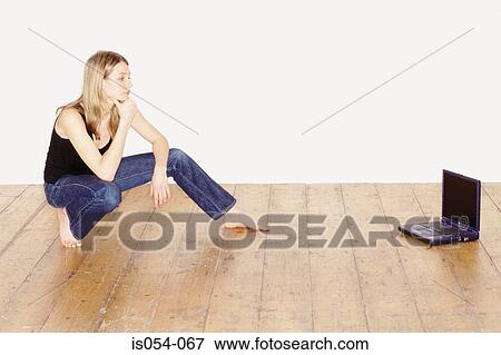Woman with laptop View Large Photo Image Stock Photo - Woman with laptop. Fotosearch