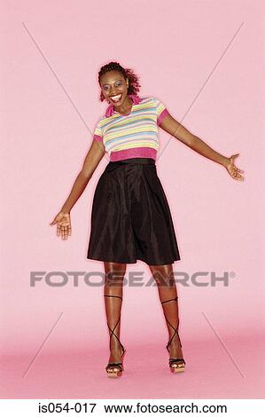 Young woman in black skirt View Large Photo Image Stock Photo - Young woman in black skirt. Fotosearch