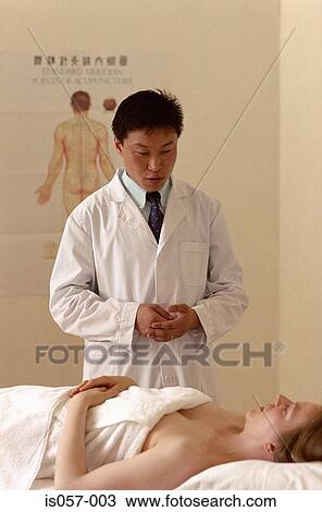 Acupuncture consultation View Large Photo Image Stock Image - Acupuncture consultation. Fotosearch