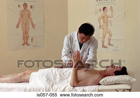 Acupuncture session View Large Photo Image Stock Photography - Acupuncture session. Fotosearch