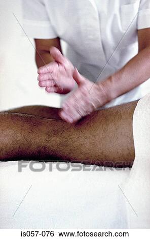 Sports massage View Large Photo Image Stock Photograph - Sports massage. Fotosearch