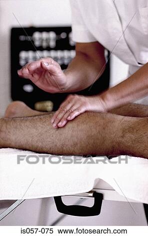 Stock Photography - Sports massage. Fotosearch