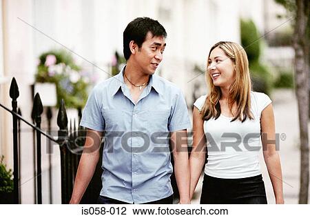 Couple holding hands View Large Photo Image Stock Image - Couple holding hands. Fotosearch