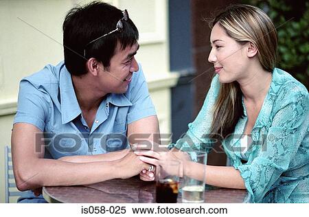 Couple in café View Large Photo Image Stock Photography - Couple in café. Fotosearch