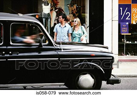 Couple in street View Large Photo Image Stock Photo - Couple in street. Fotosearch