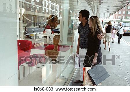 Couple window-shopping View Large Photo Image Stock Image - Couple window-shopping. Fotosearch
