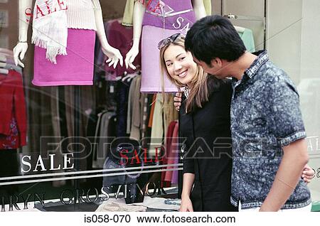 Couple window-shopping View Large Photo Image Stock Image - Couple window-shopping. Fotosearch