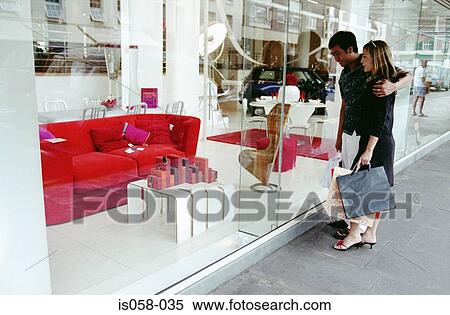 Couple window-shopping View Large Photo Image Stock Photography - Couple window-shopping. Fotosearch