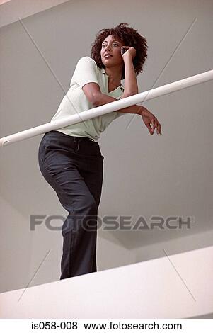 Woman on phone View Large Photo Image Stock Photo - Woman on phone. Fotosearch