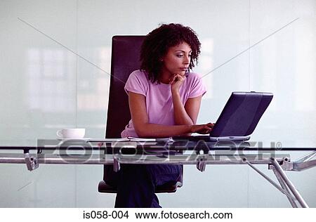 Woman with laptop View Large Photo Image Picture - Woman with laptop. Fotosearch