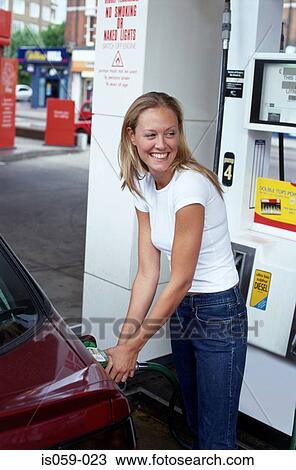 Girl at petrol station View Large Photo Image Stock Image - Girl at petrol station. Fotosearch