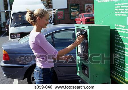 Girl buying parking ticket View Large Photo Image Stock Image - Girl buying parking ticket. Fotosearch