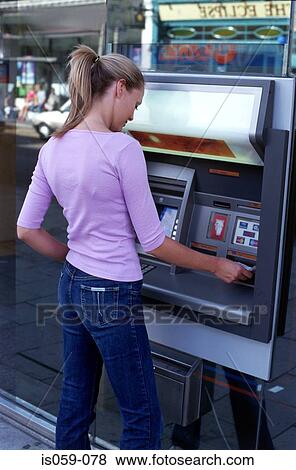 Picture - Girl cashing money. Fotosearch - Search Stock Photos, Images, Print Photographs, and Photo Clip Art