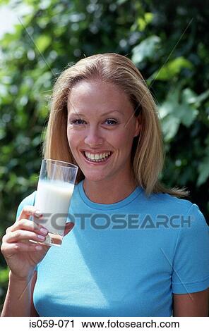 Girl drinking milk View Large Photo Image Stock Image - Girl drinking milk. Fotosearch