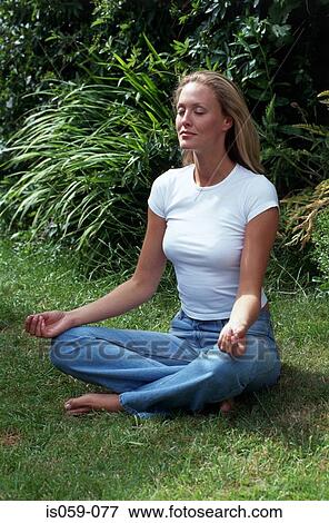 Girl meditating View Large Photo Image Stock Photo - Girl meditating. Fotosearch