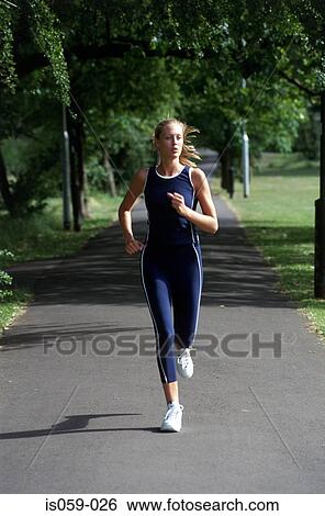 Girl running View Large Photo Image Stock Photograph - Girl running. Fotosearch