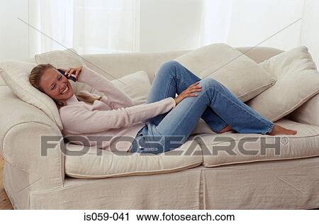Stock Image - Girl talking on phone. Fotosearch