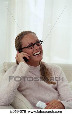 Girl talking on phone View Large Photo Image Stock Photograph - Girl talking on phone. Fotosearch