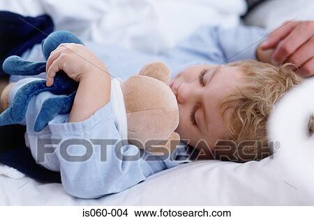 Picture - Boy asleep. Fotosearch
