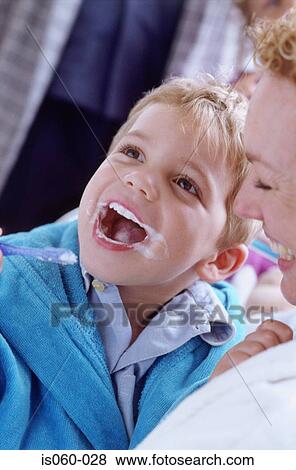 Boy brushing teeth View Large Photo Image Stock Photo - Boy brushing teeth. Fotosearch